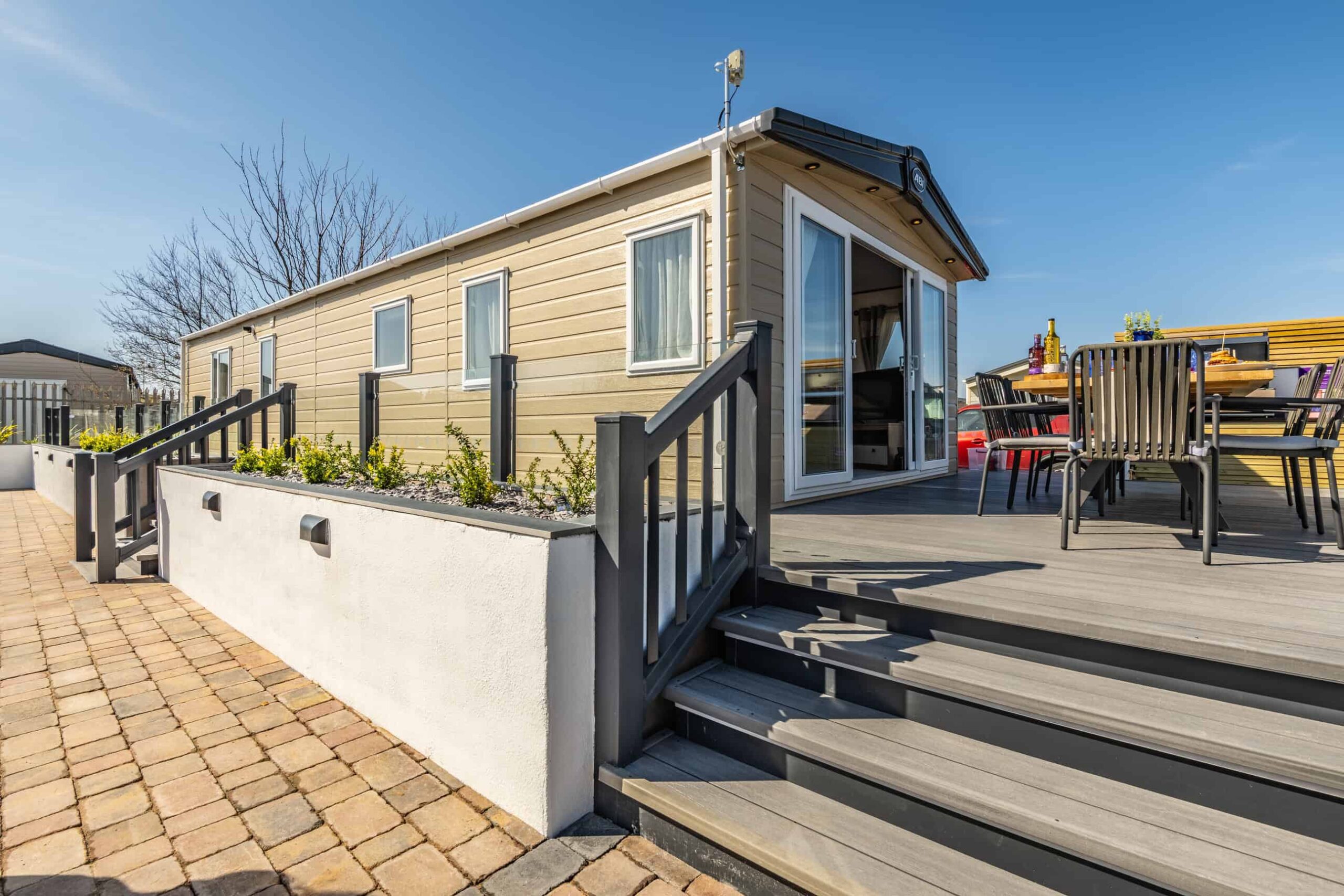 Lodge exterior showing decking and seating.